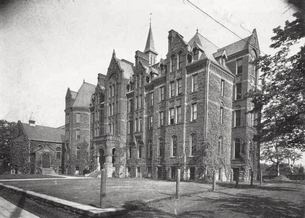 Archival photo of a Gothic-style McMaster University stone building on the Toronto campus